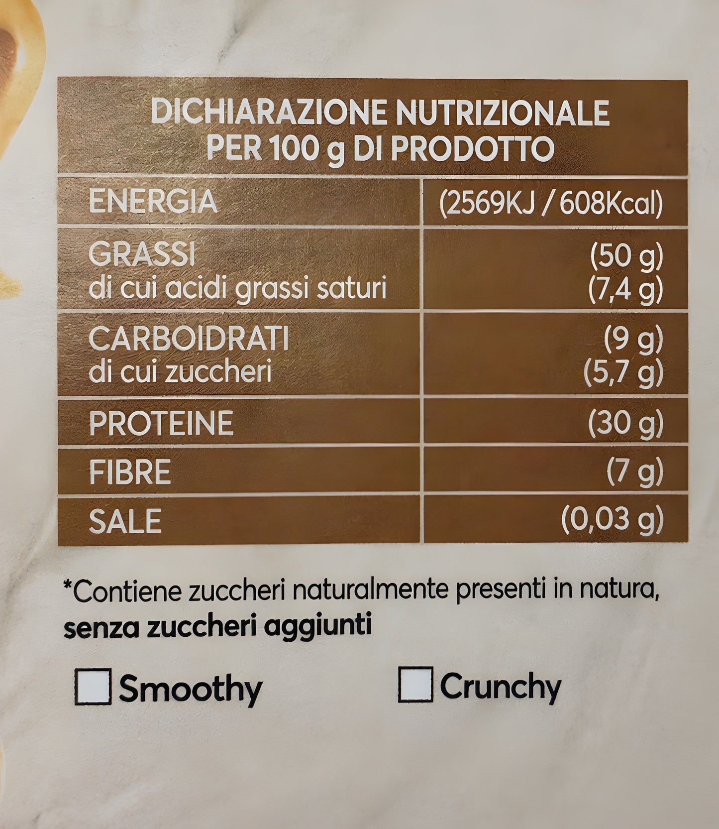 Bslabs natural peanut butter jar with a label, highlighting high protein content and no added sugars, on a white background.