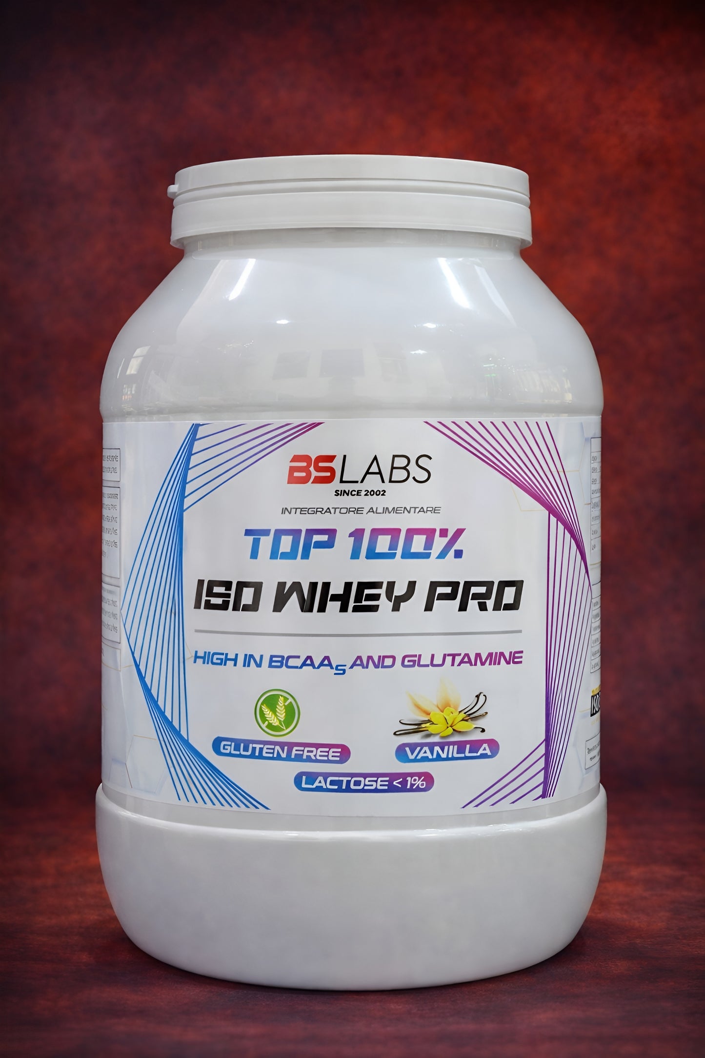 Bslabs ISO Whey Protein Isolate 900g container with label showing 85% protein, BCAA, and glutamine in a white tub.