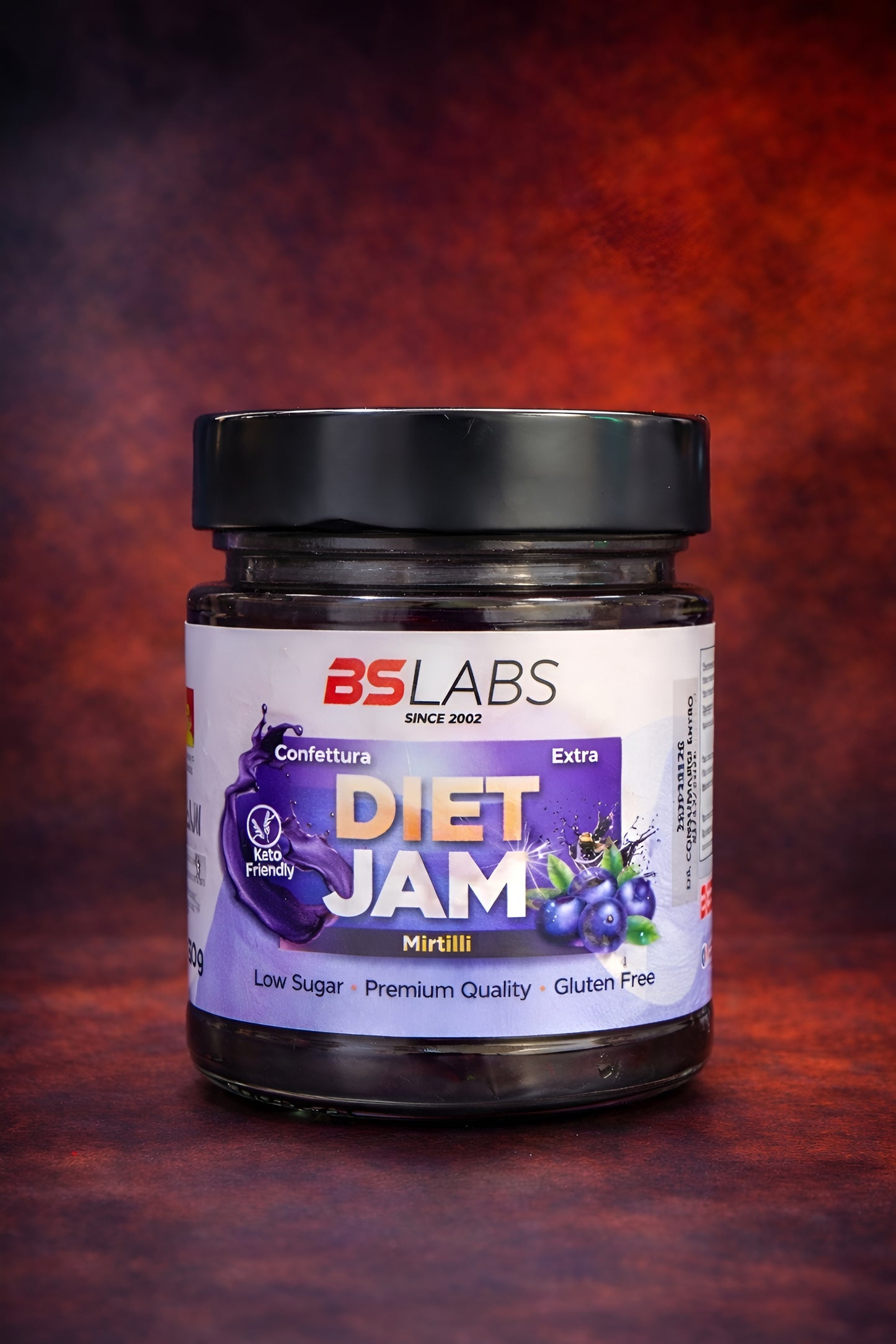 Low sugar diet jam by BSLABS, a natural confettura extra with no added sugars, shown in a jar with fresh fruit.