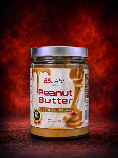 Bslabs 100% natural peanut butter jar with high protein content and no added sugars, showing the product label and peanut butter inside.